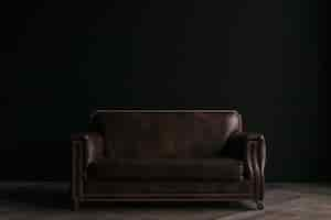 Free photo leather couch in dark room