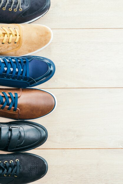 Leather shoes on wooden background