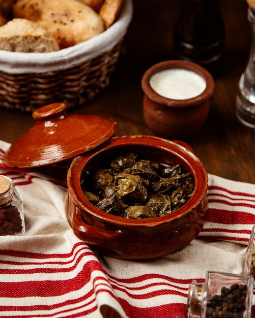 Leaves dolma white bread and yogurt