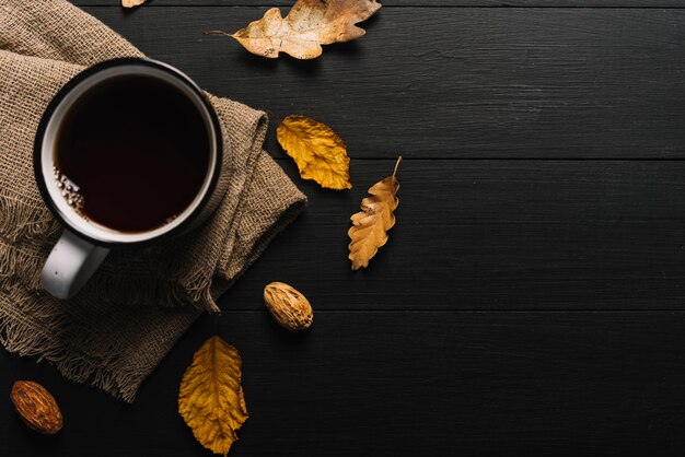 Leaves and kernels near cloth and beverage