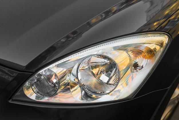 Led headlight of black automobile