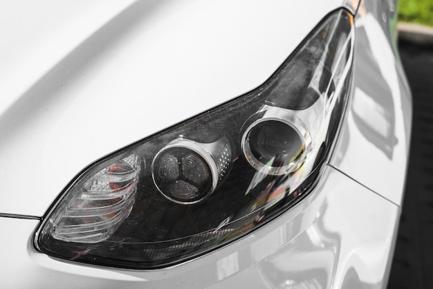 Led headlight of white car