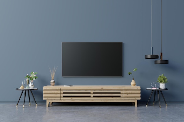 Led tv on the dark blue wall in living roomminimal design3d rendering Free Photo