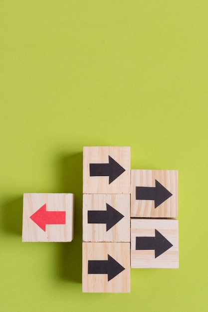 Left and right arrows on wooden cubes top view