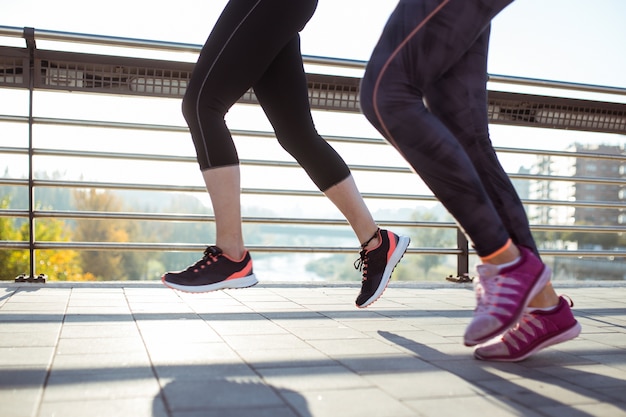 Legs close-up of women running