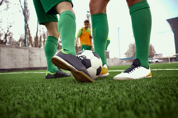 Free photo legs of soccer football player