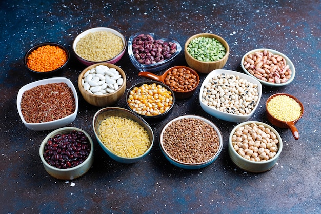 Legumes and beans assortment in different bowls