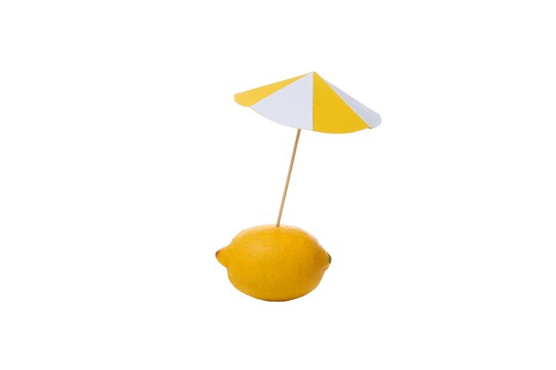 Lemon and beach umbrella isolated on white background