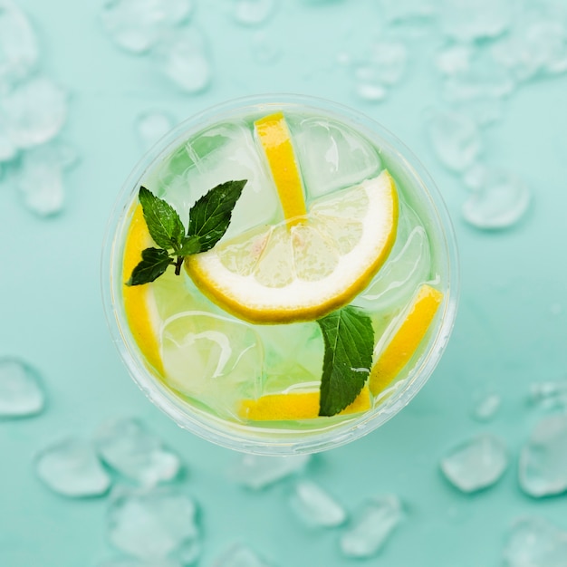 Lemon cocktail with cubes of ice