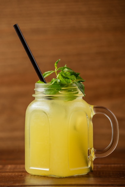 Lemon cocktail with mint leaves