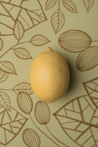 Lemon over outline floral background