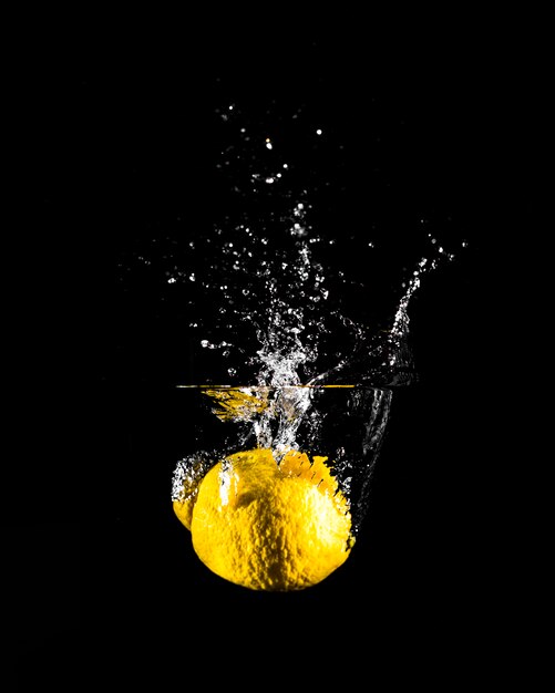 Lemon plunging into the water