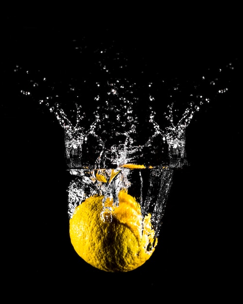 Lemon plunging into the water