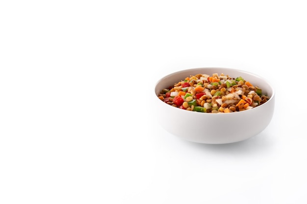 Lentil salad with peppersonion and carrot in a bowl isolated on white background
