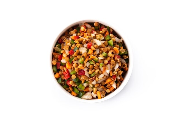 Lentil salad with peppersonion and carrot in a bowl isolated on white background