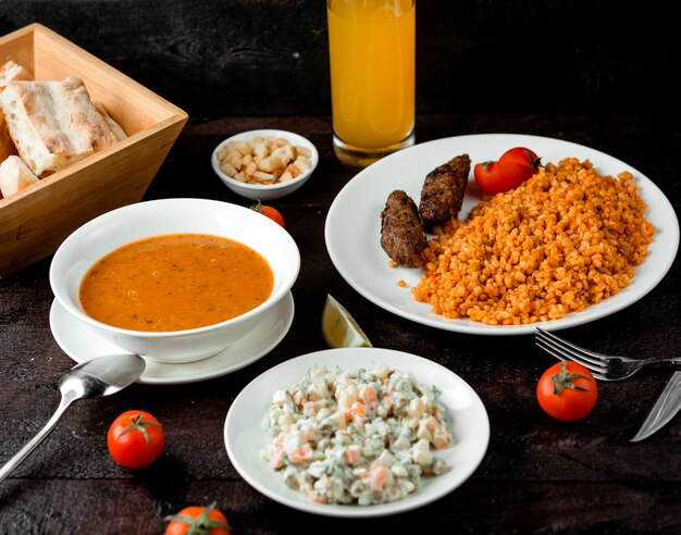 Lentil soup, capital salad and bulgur lunch with cutlets