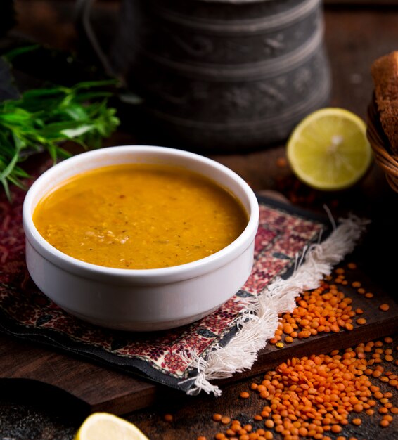 Lentil soup in a white bowl