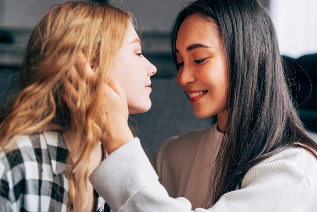 Lesbian couple about to kiss