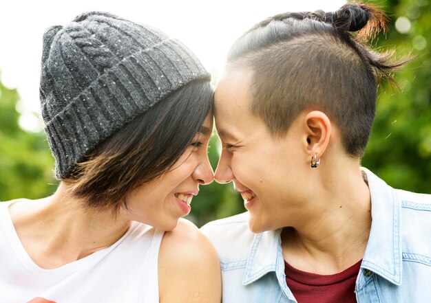 Lesbian couple dating in a park