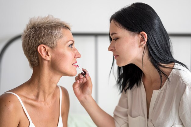 Lesbian couple make up moments at home