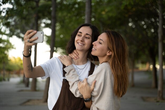 Lesbian couple taking a photo together