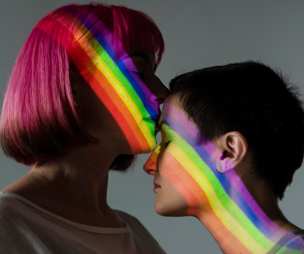 Lesbian couple with lgbt symbol