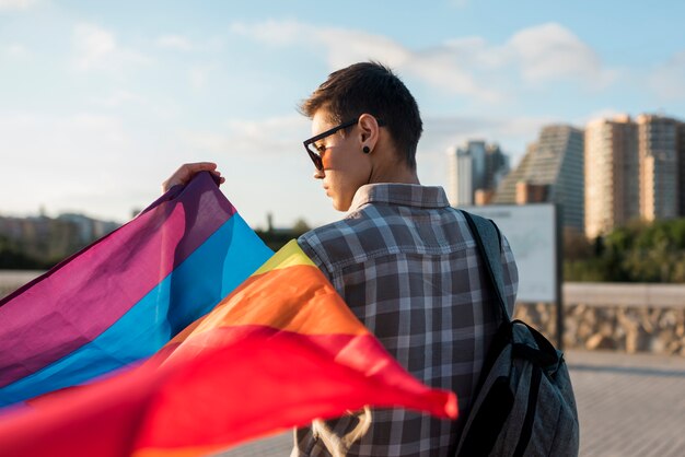 Lesbian with flying rainbow flag