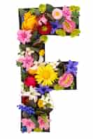 Free photo letter f made of real natural flowers and leaves on white background isolated