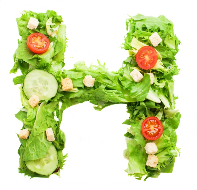 Free photo letter h with fresh tomatoes