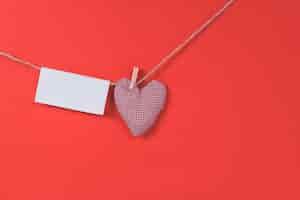 Free photo letter hanging on a rope with a heart