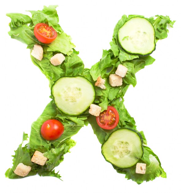 Letter x made with appetizing tomatoes