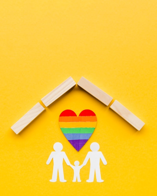Free photo lgbt family concept on yellow background  with copy space