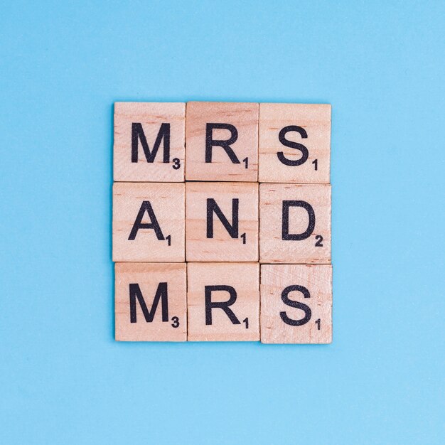 LGBT text Mrs and Mrs on wooden elements