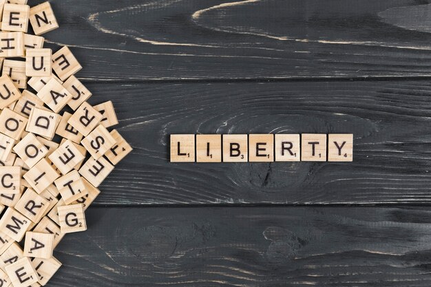 Liberty word on wooden background