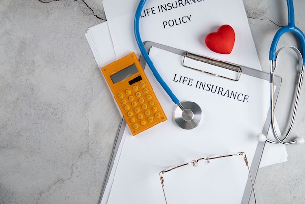 Life insurance concept with calculator
