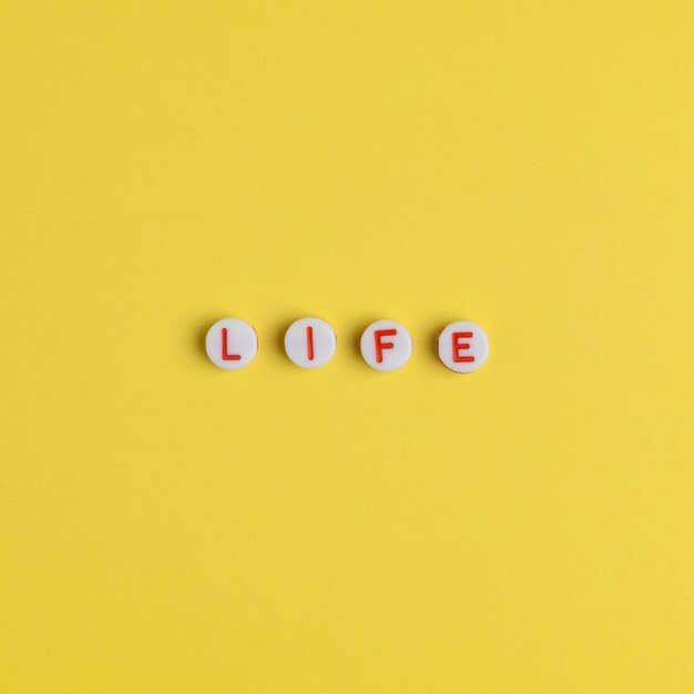 LIFE, word with beads