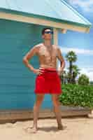 Free photo lifeguard wearing sunglasses full shot