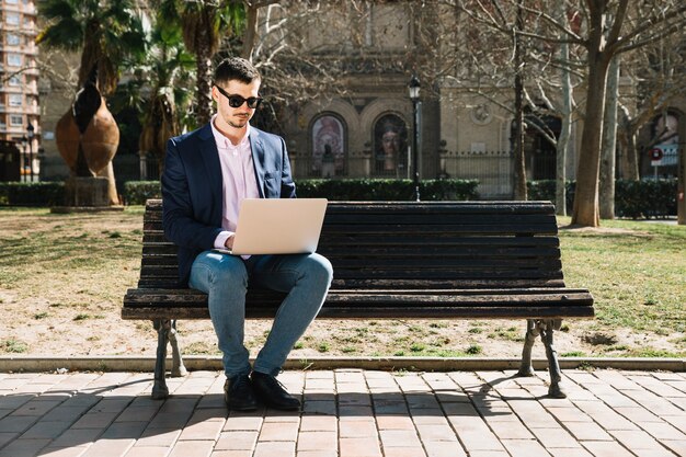 Lifestyle of modern businessman in park