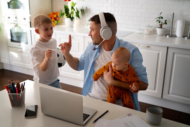 Lifestyle of parents working remotely with children at home