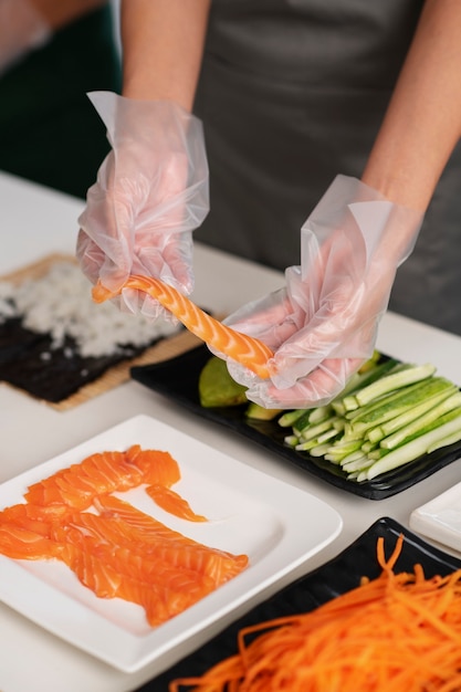 Lifestyle: people learning to make sushi