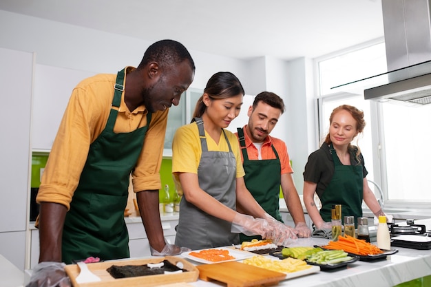 Free photo lifestyle: people learning to make sushi