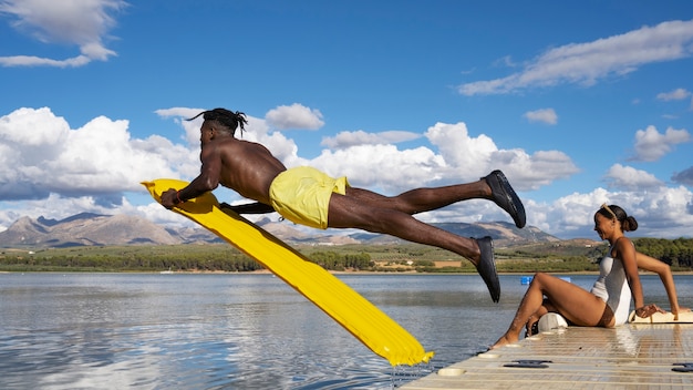 Free photo lifestyle of people swimming in lake