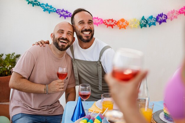 Lifestyle queer couples celebrating birthday