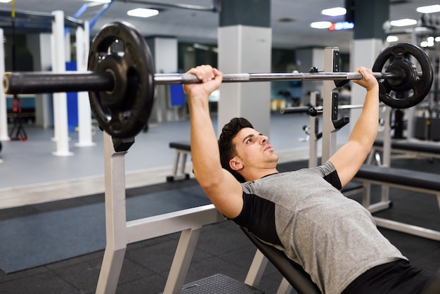 Man doing incline bench press