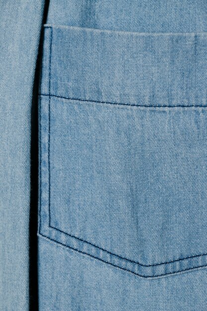 Light blue denim pocket close up