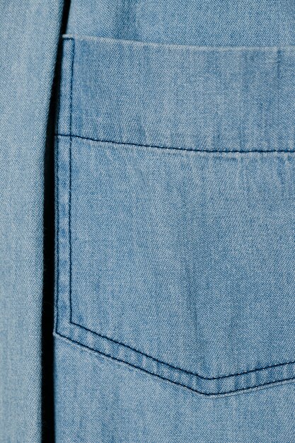 light blue denim pocket close up