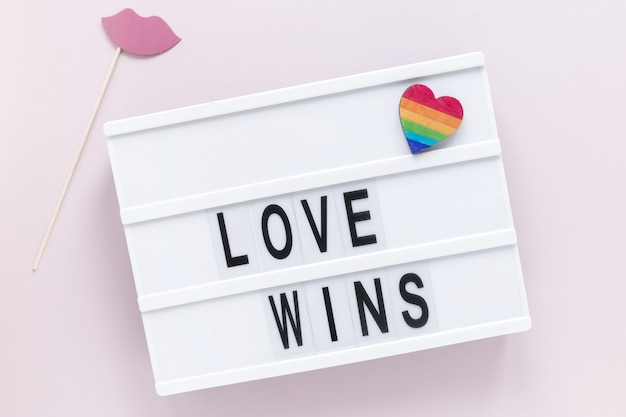 Free photo light box with love wins message