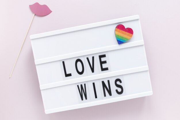 Light box with love wins message