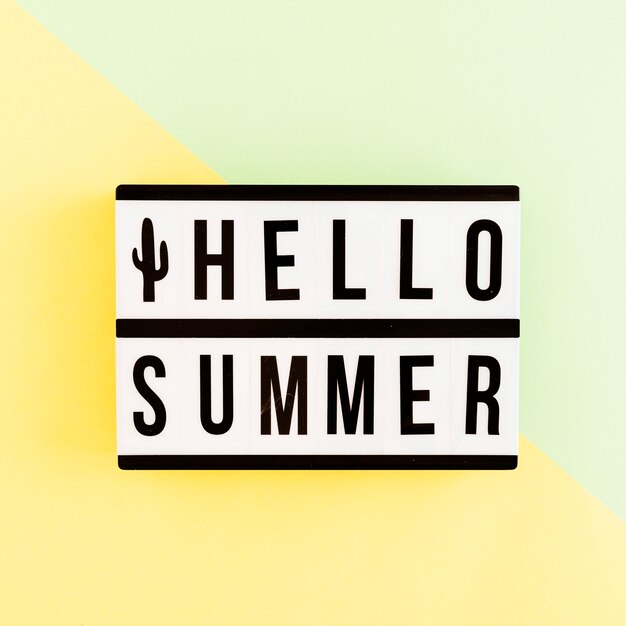 Light box with summer text on colored background