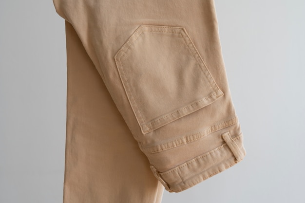 Free photo light brown beige pants indoors still life